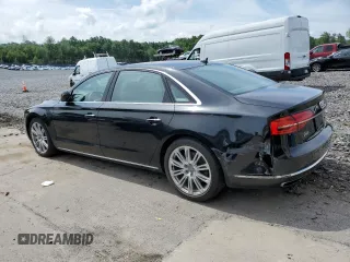 2015 Audi A8 3.0T with VIN WAU3GAFD0FN036465, listed as a Copart auction lot 64069035 with 100,149 mi miles and Salvage title. Bid and sale history available at DreamBid. Image 2.