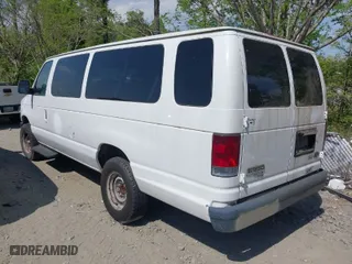 2009 Ford Econoline Wagon XL with VIN 1FBSS31L79DA40051, listed as a IAAI auction lot 41991120 with 170,373 mi miles. Bid and sale history available at carsss.com. Image 3.