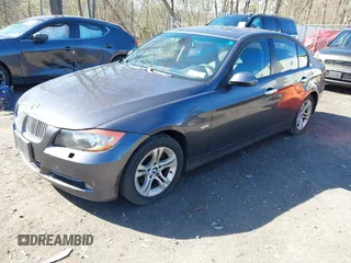 2008 BMW 3 Series 328xi with VIN WBAVC93518K043073, listed as a IAAI auction lot 42134507 with 148,712 mi miles. Bid and sale history available at carsss.com. Image 2.