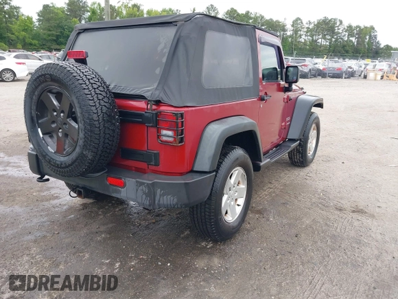 2012 Jeep Wrangler Sport with VIN 1C4AJWAG3CL197295, listed as a IAAI auction lot 42349118 with 117,381 mi miles and . Bid and sale history available at DreamBid. Image 4.