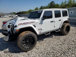 2021 Jeep Wrangler Unlimited Rubicon with VIN 1C4HJXFN3MW634045, listed as a Copart auction lot 52684805 with 34,133 mi miles and Clean Title. Bid and sale history available at DreamBid. Image 1.