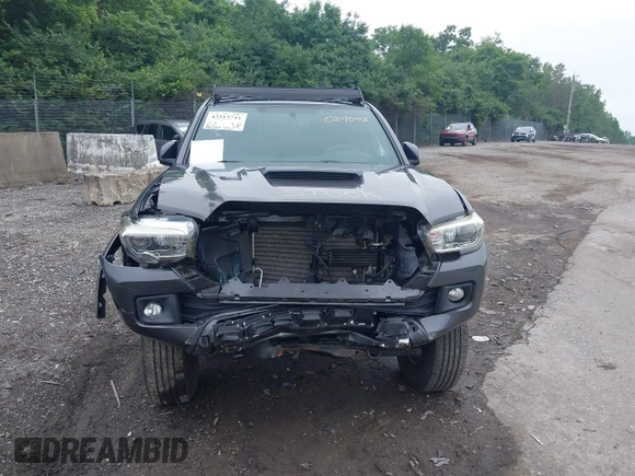 2017 Toyota Tacoma SR5 with VIN 3TMCZ5ANXHM089093, listed as a IAAI auction lot 42513711 with 86,022 mi miles and . Bid and sale history available at DreamBid. Image 12.