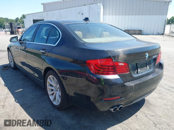 2014 BMW 5 Series 535d with VIN WBAXA5C52ED689410, listed as a IAAI auction lot 42554790 with 136,744 mi miles and . Bid and sale history available at DreamBid. Image 3.