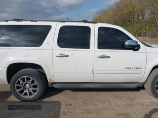 2013 Chevrolet Suburban LT with VIN 1GNSKJE79DR328718, listed as a IAAI auction lot 42005926 with 168,610 mi miles and . Bid and sale history available at DreamBid. Image 14.