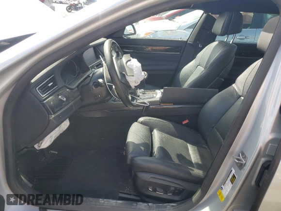 2015 BMW 7 Series 740Li with VIN WBAYE4C52FD947168, listed as a Copart auction lot 71287564 with 103,444 mi miles and Salvage Title. Bid and sale history available at DreamBid. Image 7.