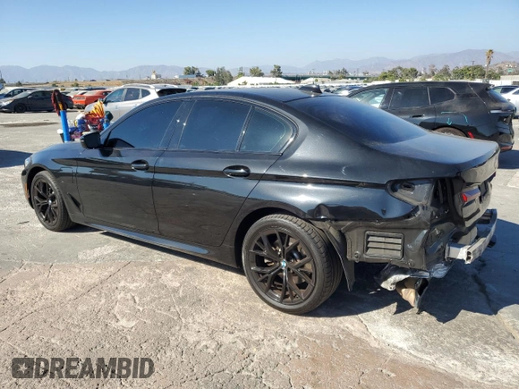 2021 BMW 5 Series 530e with VIN WBA13AG04MCF47235, listed as a Copart auction lot 69120474 with 74,779 mi miles and Salvage Title. Bid and sale history available at carsss.com. Image 2.