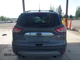 2014 Ford Escape Titanium with VIN 1FMCU9JX0EUC45801, listed as a IAAI auction lot 42121561 with 80,217 mi miles and . Bid and sale history available at DreamBid. Image 16.