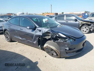 2023 Tesla Model 3 Long Range z VIN 5YJ3E1EB2PF658915, wystawiony jako IAAI lot #41968674 z przebiegiem Nie podano mil oraz . Historia ofert i sprzedaży dostępna na DreamBid. Obrazek 1.