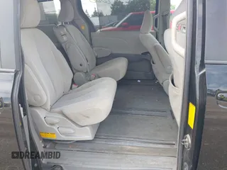 2013 Toyota Sienna LE AAS with VIN 5TDKK3DC3DS392029, listed as a IAAI auction lot 42366000 with 199,237 mi miles and . Bid and sale history available at DreamBid. Image 8.
