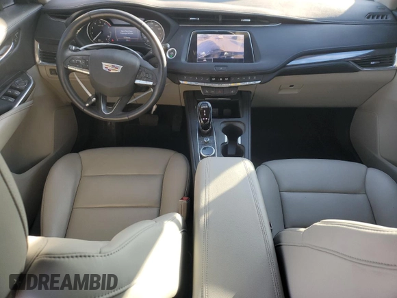 2023 Cadillac XT4 FWD Luxury z VIN 1GYAZAR42PF102696, wystawiony jako Copart lot #85540204 z przebiegiem 1 903 mil mil oraz Szkoda całkowita • Salvage title. Historia ofert i sprzedaży dostępna na DreamBid. Obrazek 8.