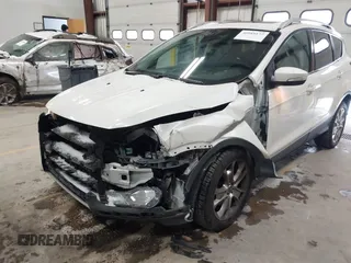2014 Ford Escape Titanium with VIN 1FMCU9J91EUD43432, listed as a IAAI auction lot 40989177 with 110,383 mi miles and . Bid and sale history available at DreamBid. Image 6.