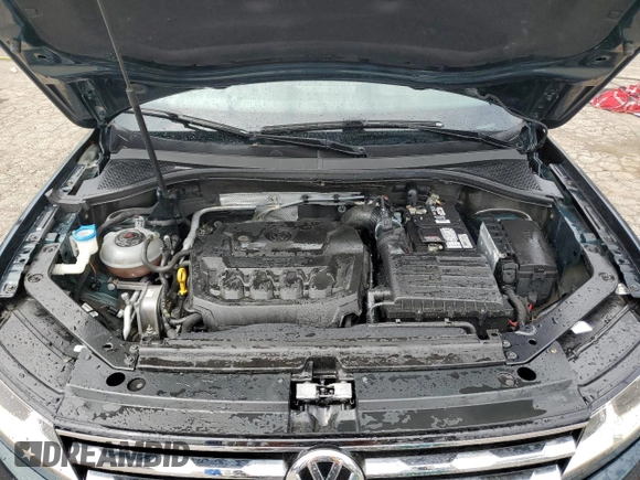 2018 Volkswagen Tiguan S with VIN 3VV0B7AX2JM017137, listed as a Copart auction lot 54618705 with 69,026 mi miles and Clean Title. Bid and sale history available at DreamBid. Image 12.