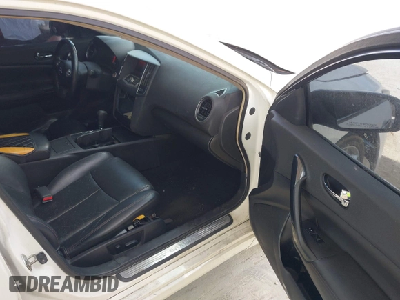 2013 Nissan Maxima SV with VIN 1N4AA5AP8DC814580, listed as a IAAI auction lot 42179159 with 122,758 mi miles and . Bid and sale history available at DreamBid. Image 5.