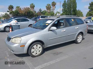 2006 Suzuki Forenza z VIN KL5JD86Z06K325179, wystawiony jako IAAI lot #42507357 z przebiegiem Nie podano mil oraz . Historia ofert i sprzedaży dostępna na DreamBid. Obrazek 2.
