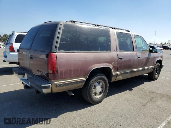 1997 Chevrolet Suburban with VIN 1GNEC16R4VJ418725, listed as a Copart auction lot 75766084 with 216,722 mi miles and Salvage Title. Bid and sale history available at carsss.com. Image 3.