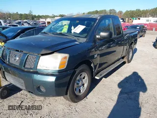 2004 Nissan Titan XE with VIN 1N6AA06A74N515598, listed as a IAAI auction lot 41125000 with 235,429 mi miles and . Bid and sale history available at DreamBid. Image 2.