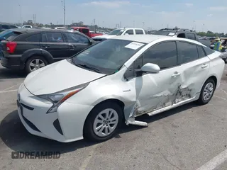 2016 Toyota Prius Two z VIN JTDKBRFU3G3024092, wystawiony jako IAAI lot #42338381 z przebiegiem 87 216 mil mil oraz . Historia ofert i sprzedaży dostępna na DreamBid. Obrazek 2.