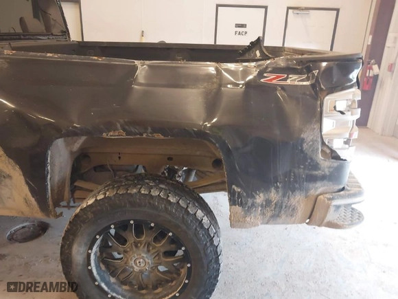 2015 Chevrolet Silverado 1500 LT with VIN 1GCVKRECXFZ354846, listed as a IAAI auction lot 41252244 with 216,467 mi miles. Bid and sale history available at carsss.com. Image 6.