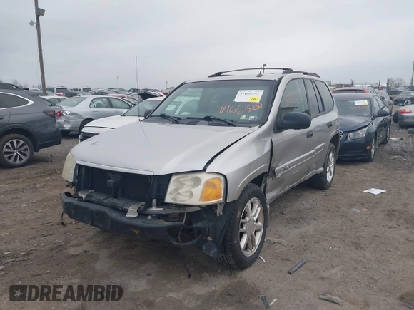 2004 GMC Envoy SLE with VIN 1GKDT13SX42135951, listed as a IAAI auction lot 41668252 with 216,193 mi miles. Bid and sale history available at carsss.com. Image 6.