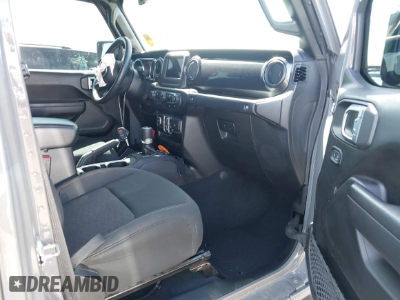 2022 Jeep Gladiator Texas Trail with VIN 1C6HJTAG5NL132990, listed as a IAAI auction lot 42514388 with 38,601 mi miles and . Bid and sale history available at DreamBid. Image 5.