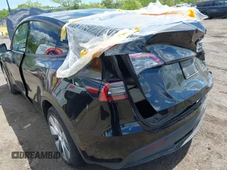 2023 Tesla Model Y Long Range with VIN 7SAYGDEE0PA183891, listed as a IAAI auction lot 42205573 with 41,273 mi miles and . Bid and sale history available at DreamBid. Image 19.