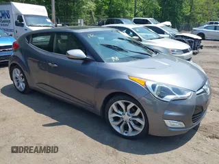 2013 Hyundai Veloster w/Gray Int with VIN KMHTC6AD5DU132237, listed as a IAAI auction lot 42268005 with 84,646 mi miles and . Bid and sale history available at DreamBid. Image 1.