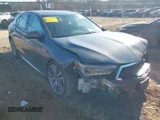 2020 Acura TLX w/Technology Pkg with VIN 19UUB3F49LA003406, listed as a IAAI auction lot 41352592 with 73,125 mi miles. Bid and sale history available at carsss.com. Image 1.