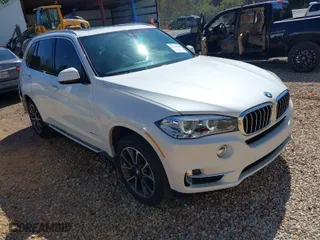 2017 BMW X5 sDrive35i with VIN 5UXKR2C39H0U23699, listed as a IAAI auction lot 41769360 with NaN miles. Bid and sale history available at carsss.com. Image 1.
