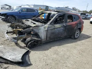 2014 BMW X1 xDrive28i with VIN WBAVL1C50EVY17163, listed as a Copart auction lot 47299605 with 0 mi miles and Non Repairable. Bid and sale history available at carsss.com. Image 1.