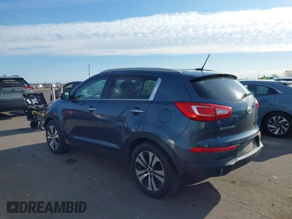 2012 Kia Sportage EX with VIN KNDPCCA22C7325011, listed as a IAAI auction lot 42046727 with 131,475 mi miles and . Bid and sale history available at DreamBid. Image 3.