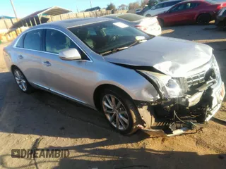 2014 Cadillac XTS Luxury with VIN 2G61M5S30E9187222, listed as a IAAI auction lot 41842676 with 113,594 mi miles. Bid and sale history available at carsss.com. Image 1.