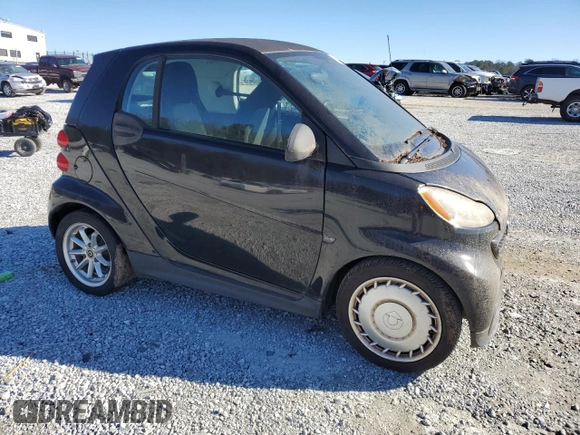 2013 Smart fortwo Pure z VIN WMEEJ3BA1DK666323, wystawiony jako Copart lot #87106934 z przebiegiem 92 313 mil mil oraz Tytuł czysty. Historia ofert i sprzedaży dostępna na DreamBid. Obrazek 4.