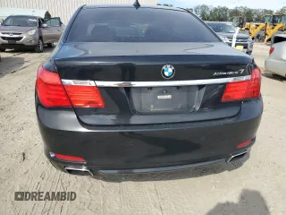 2011 BMW 7 Series with VIN WBAKX8C52BC198377, listed as a Copart auction lot 70003444 with 173,725 mi miles and Salvage title. Bid and sale history available at DreamBid. Image 6.