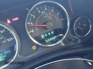 2018 Jeep Wrangler JK Unlimited Sport S with VIN 1C4BJWDG3JL900973, listed as a IAAI auction lot 41239817 with 50,952 mi miles. Bid and sale history available at carsss.com. Image 7.
