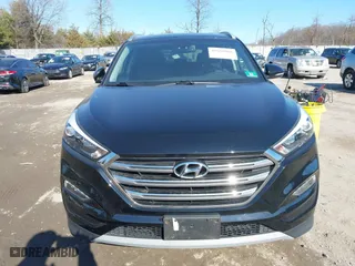 2018 Hyundai Tucson Value with VIN KM8J3CA26JU700642, listed as a IAAI auction lot 41655085 with 80,903 mi miles. Bid and sale history available at carsss.com. Image 12.