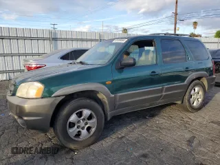 2001 Mazda Tribute LX with VIN 4F2YU09101KM05395, listed as a Copart auction lot 82409584 with 253,210 mi miles and Salvage Title. Bid and sale history available at carsss.com. Image 1.