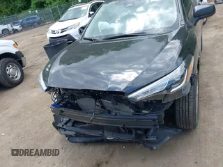 2023 Toyota Corolla Cross L z VIN 7MUAAABG8PV056556, wystawiony jako IAAI lot #42212865 z przebiegiem 13 948 mil mil oraz . Historia ofert i sprzedaży dostępna na DreamBid. Obrazek 12.