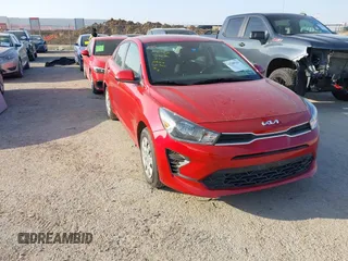 2023 Kia Rio S z VIN 3KPA24ADXPE604180, wystawiony jako IAAI lot #41798161 z przebiegiem 12 134 mil mil oraz . Historia ofert i sprzedaży dostępna na DreamBid. Obrazek 1.