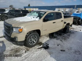 2021 GMC Canyon 4WD AT4 z VIN 1GTG6FEN8M1157828, wystawiony jako Copart lot #88392435 z przebiegiem 45 252 mil mil oraz Szkody całkowita. Historia ofert i sprzedaży dostępna na DreamBid. Obrazek 1.
