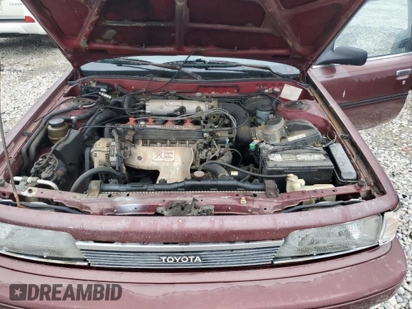 1989 Toyota Camry DLX с VIN 4T1SV21E1KU108151, выставлен на аукционе Copart как лот 73657634 с пробегом 347 186 миль миль и На запчасти • Non repairable. История ставок и продаж доступна на DreamBid. Изображение 11.
