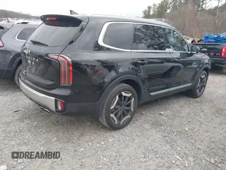 2024 Kia Telluride EX with VIN 5XYP34GC6RG445587, listed as a IAAI auction lot 41478254 with 21,299 mi miles and . Bid and sale history available at DreamBid. Image 4.