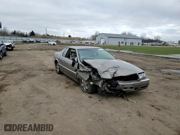 2000 Cadillac Eldorado with VIN 1G6EL12Y5YU166723, listed as a Copart auction lot 82612034 with 80,839 mi miles and Salvage title. Bid and sale history available at DreamBid. Image 11.