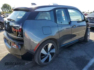 2019 BMW i3 with VIN WBY8P4C51K7E84270, listed as a Copart auction lot 77707224 with 15,584 mi miles and Salvage Title. Bid and sale history available at carsss.com. Image 3.