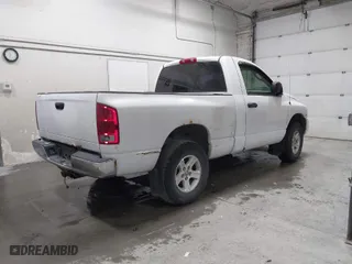 2005 Dodge Ram 1500 SLT with VIN 1D7HU16DX5J547792, listed as a IAAI auction lot 41609415 with 209,063 mi miles. Bid and sale history available at carsss.com. Image 4.