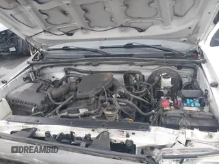 2014 Toyota Tacoma with VIN 5TFNX4CN9EX036087, listed as a IAAI auction lot 42135571 with 179,236 mi miles and . Bid and sale history available at DreamBid. Image 10.