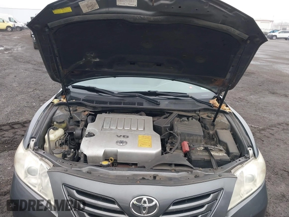 2009 Toyota Camry LE z VIN 4T1BK46K49U093612, wystawiony jako IAAI lot #41847395 z przebiegiem 250 383 mil mil oraz . Historia ofert i sprzedaży dostępna na DreamBid. Obrazek 10.