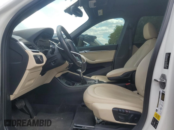 2018 BMW X1 xDrive28i with VIN WBXHT3C35J5F90062, listed as a Copart auction lot 56284945 with 138,137 mi miles and Salvage title. Bid and sale history available at DreamBid. Image 7.