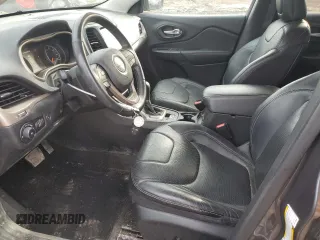 2015 Jeep Cherokee Limited with VIN 1C4PJLDB7FW701648, listed as a Copart auction lot 49612655 with 118,760 mi miles and Salvage Title. Bid and sale history available at DreamBid. Image 7.
