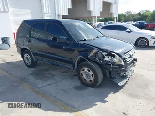 2005 Honda CR-V LX with VIN JHLRD78535C031868, listed as a IAAI auction lot 42002372 with 201,258 mi miles. Bid and sale history available at carsss.com. Image 1.