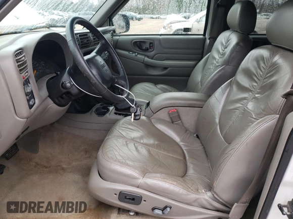 2001 GMC Jimmy SLT with VIN 1GKDT13W712155718, listed as a Copart auction lot 80688554 with 114,116 mi miles and Salvage Title. Bid and sale history available at carsss.com. Image 7.